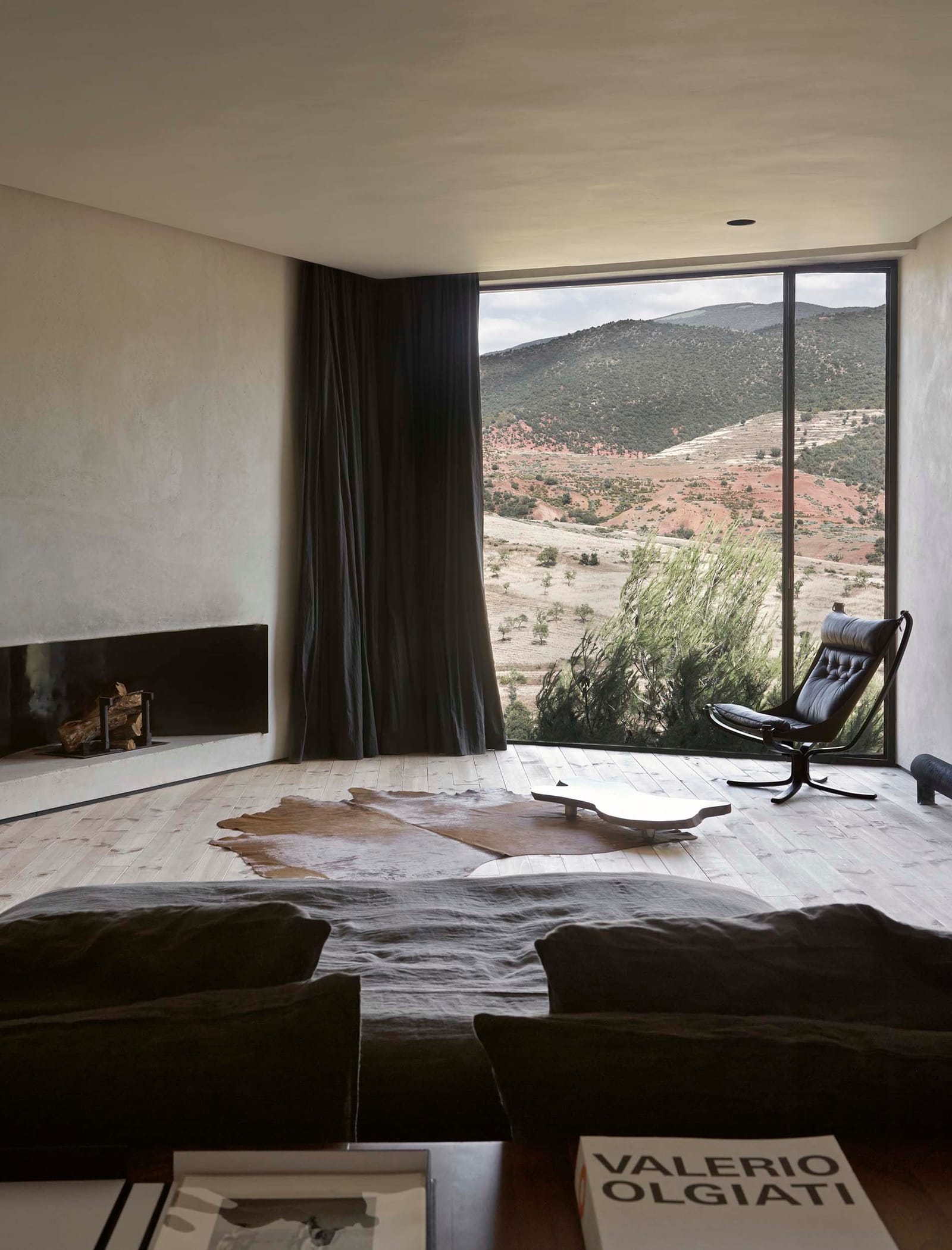 Sitting room with dark curtains and hill views, Villa E