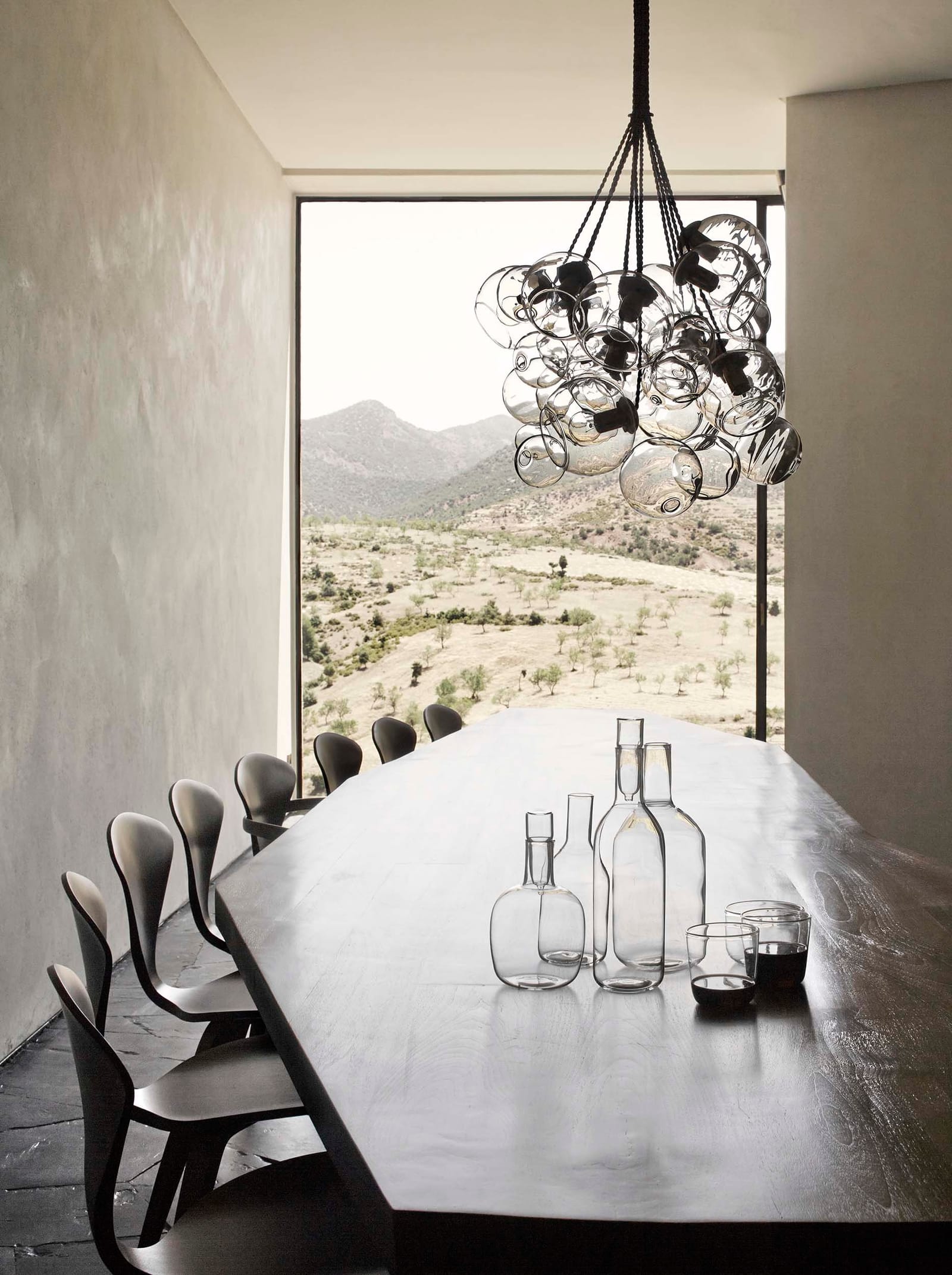 Long wooden table facing the valley at Villa E